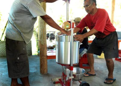 Loading Coconut Oil Press using Mats